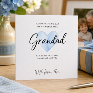 Personalised Father’s Day card for Grandad featuring elegant script lettering, soft blue heart details, and the custom sign off With love, Tom