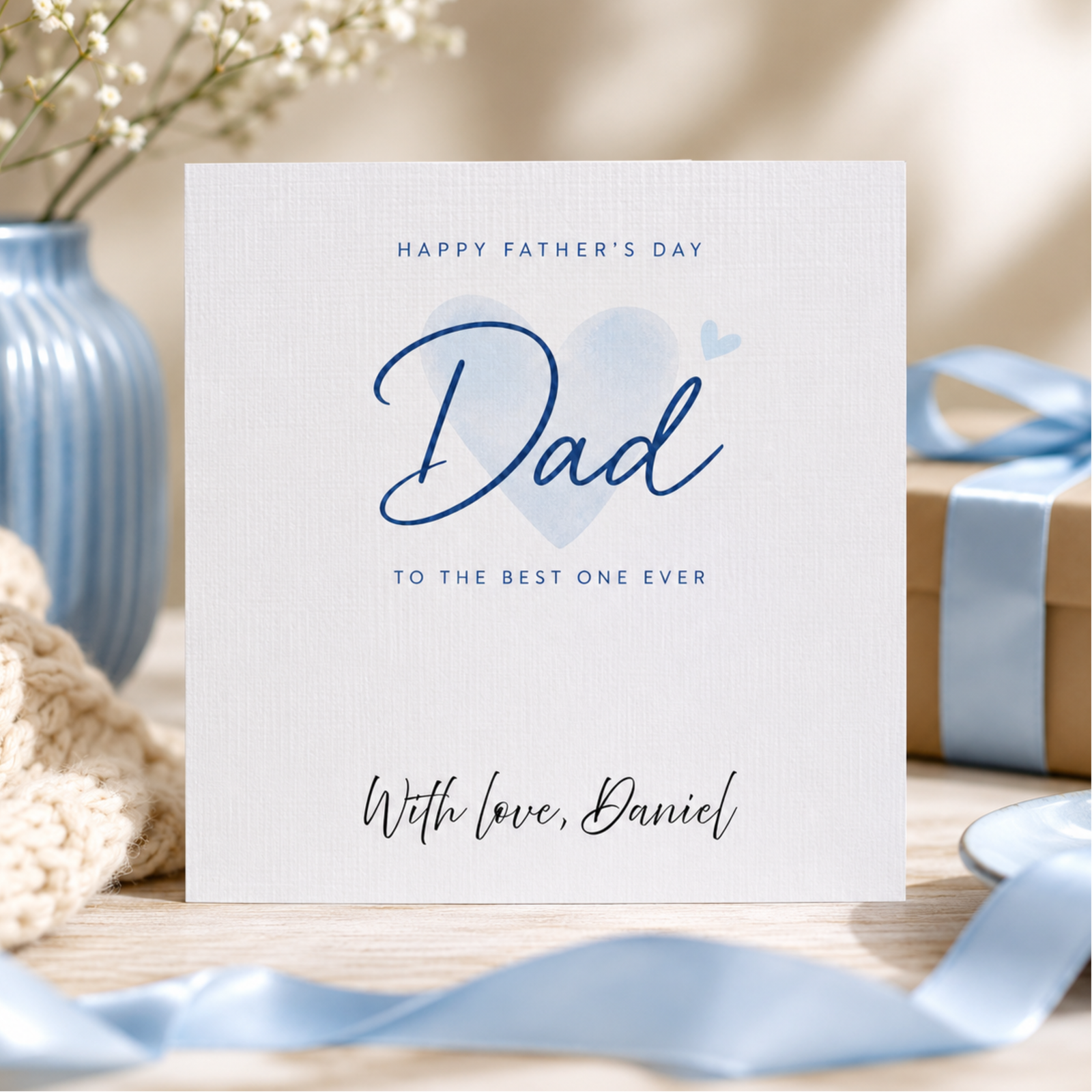 Personalised minimal blue Fathers Day card for Dad featuring elegant script lettering and the custom message With love, Daniel